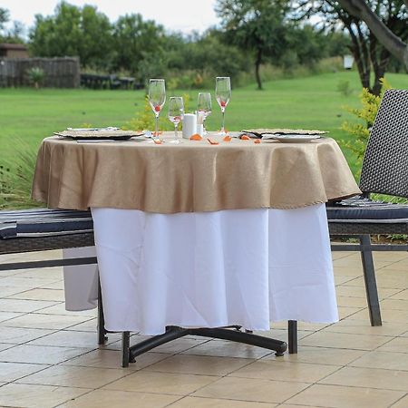 Royal Marang Hotel Phokeng Eksteriør billede A table with a tablecloth