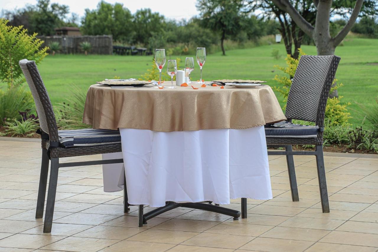 Royal Marang Hotel Phokeng Eksteriør billede A table with a tablecloth